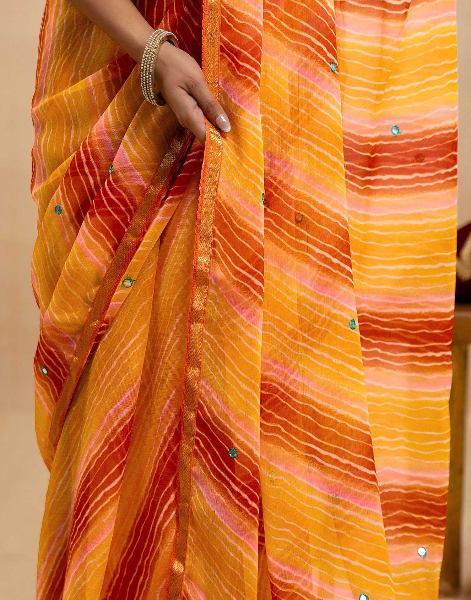 Orange Chiffon Mirror Work Laheria Printed Saree