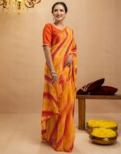 Orange Chiffon Mirror Work Laheria Printed Saree