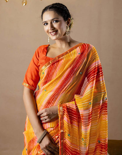 Orange Chiffon Mirror Work Laheria Printed Saree