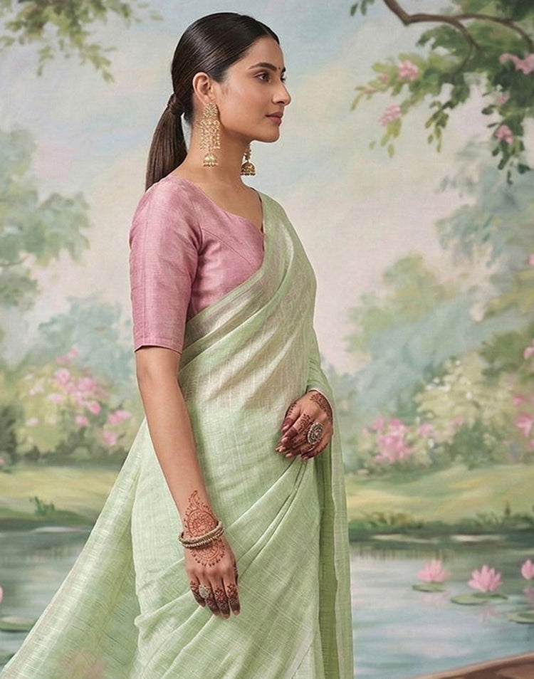 Dusty Mint Green Cotton Silk Tassels Woven Saree
