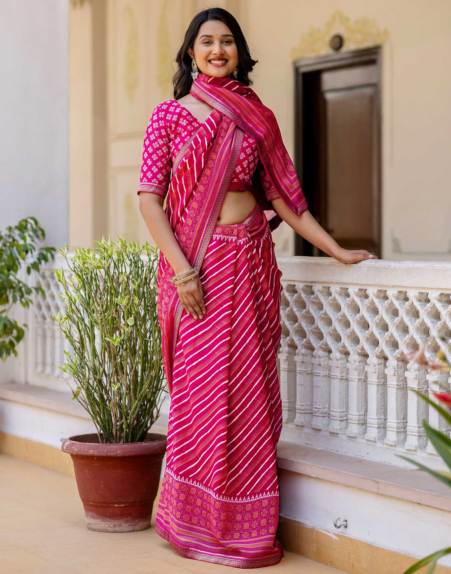 Dark Rani Pink Georgette Printed Lace Saree