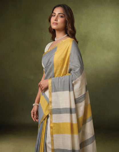Dusty Light Blue Linen Printed Zari Border Saree
