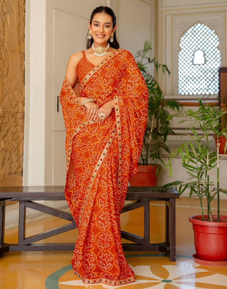 Orange Chiffon Bandhani Printed Lace Saree