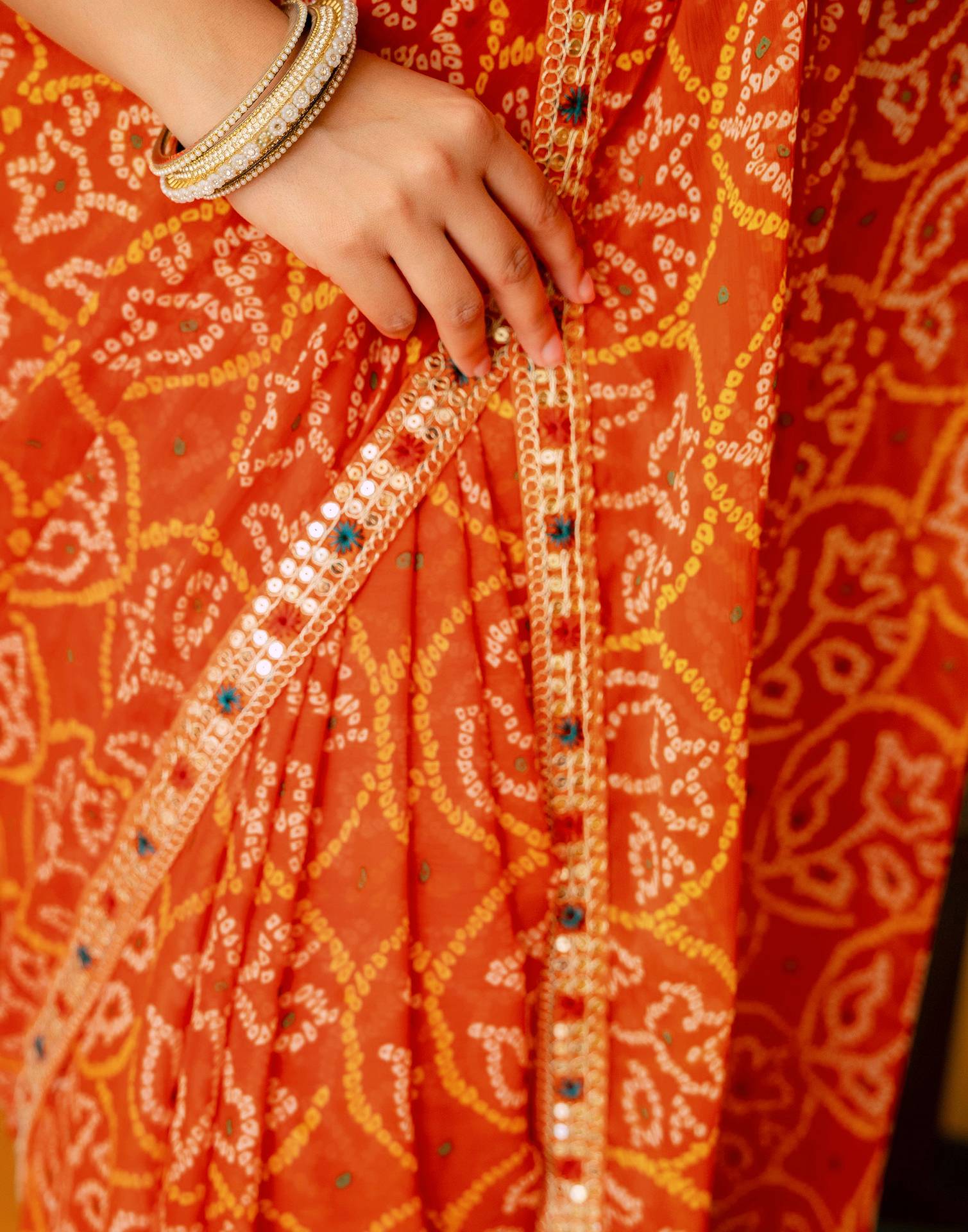 Orange Chiffon Bandhani Printed Lace Saree