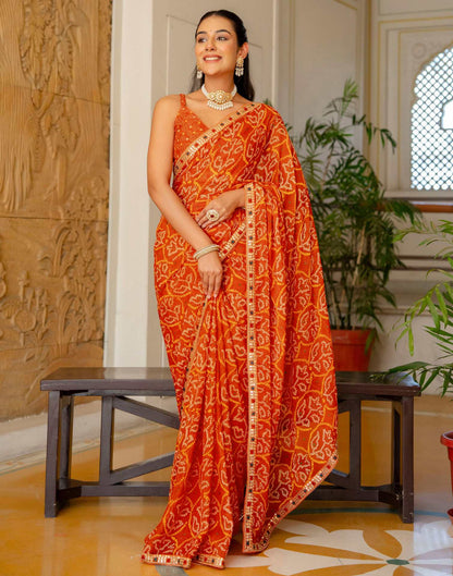 Orange Chiffon Bandhani Printed Lace Saree