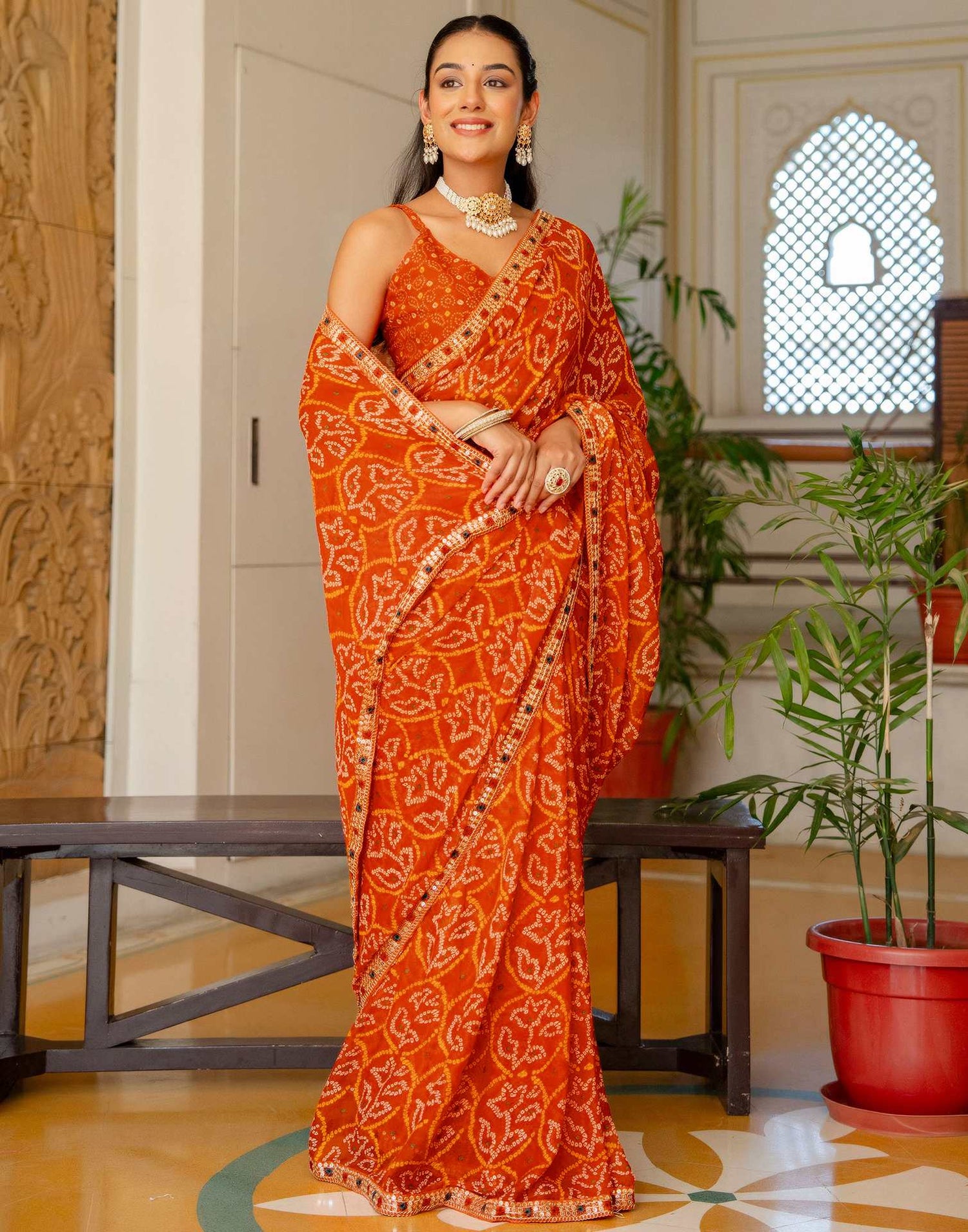 Orange Chiffon Bandhani Printed Lace Saree
