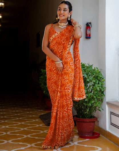 Orange Chiffon Bandhani Printed Lace Saree