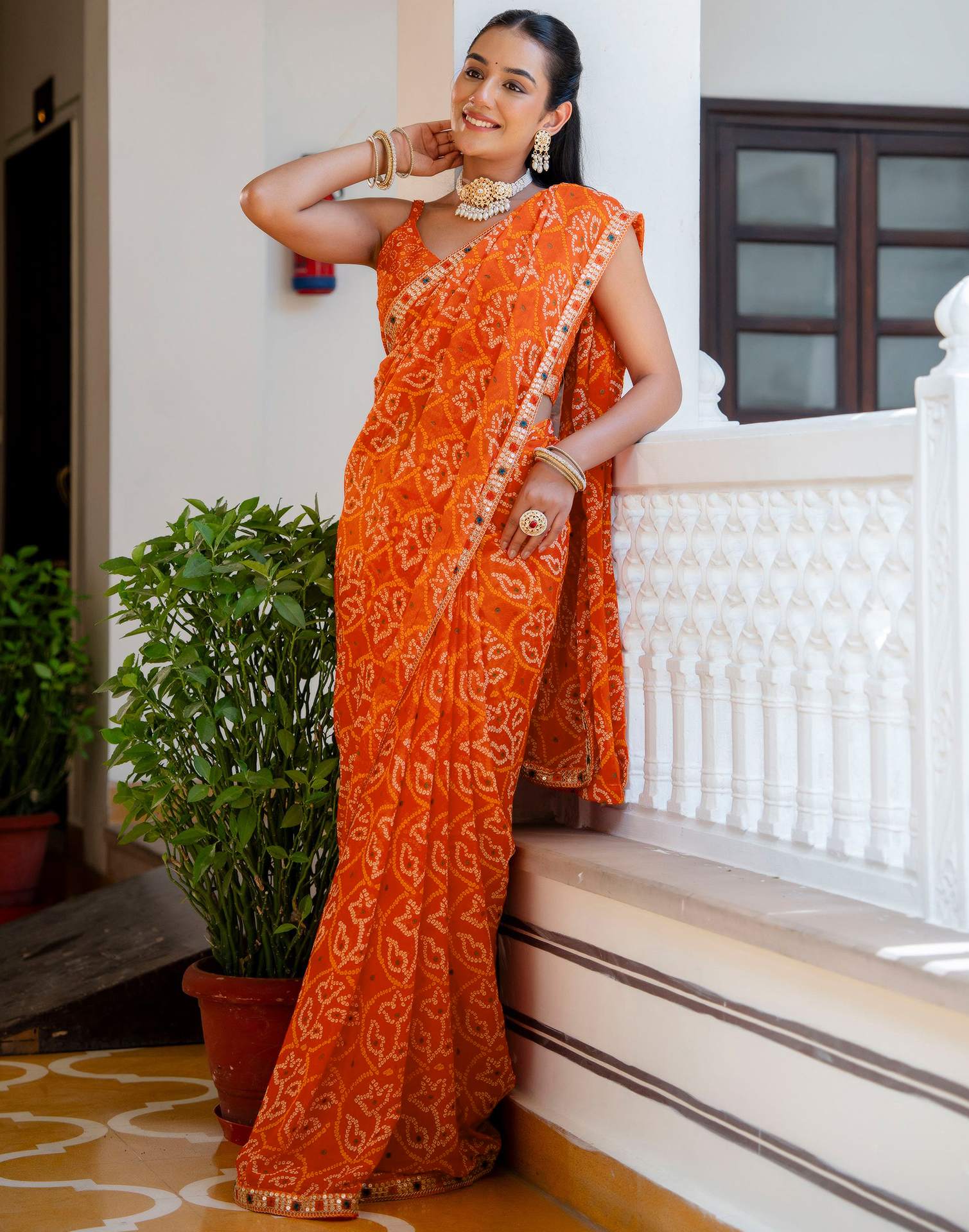 Orange Chiffon Bandhani Printed Lace Saree