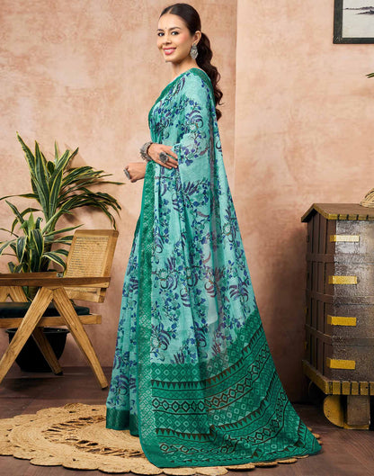 Turquoise Blue Linen Woven Border Floral Printed Saree