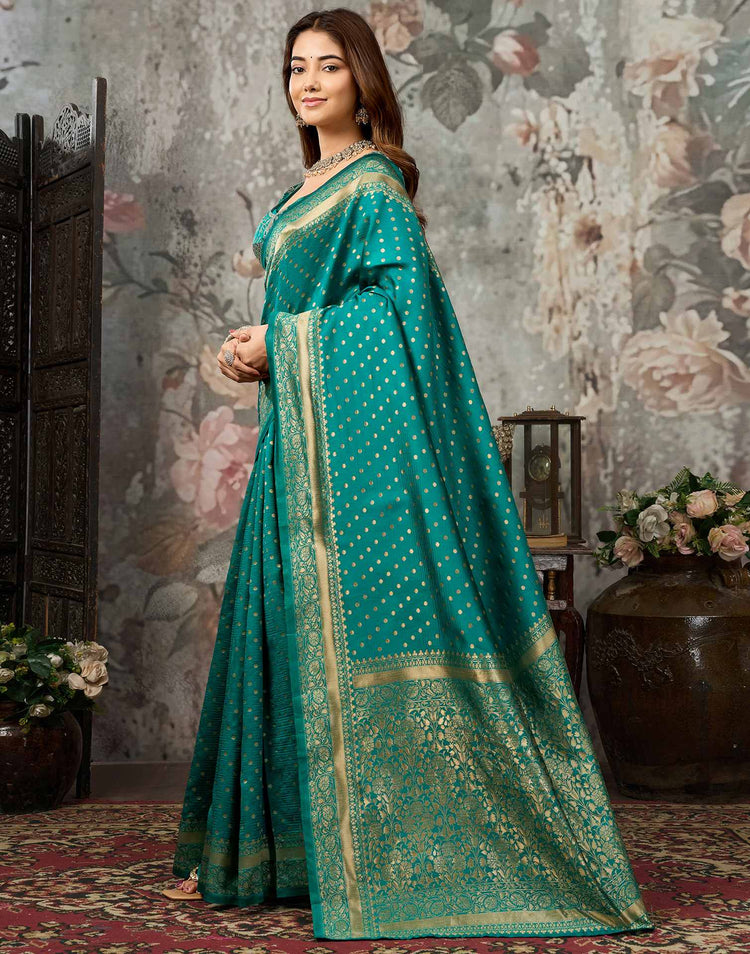 Teal Green Silk Woven Banarasi Saree With stitched Blouse