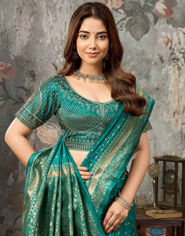 Teal Green Silk Woven Banarasi Saree With stitched Blouse