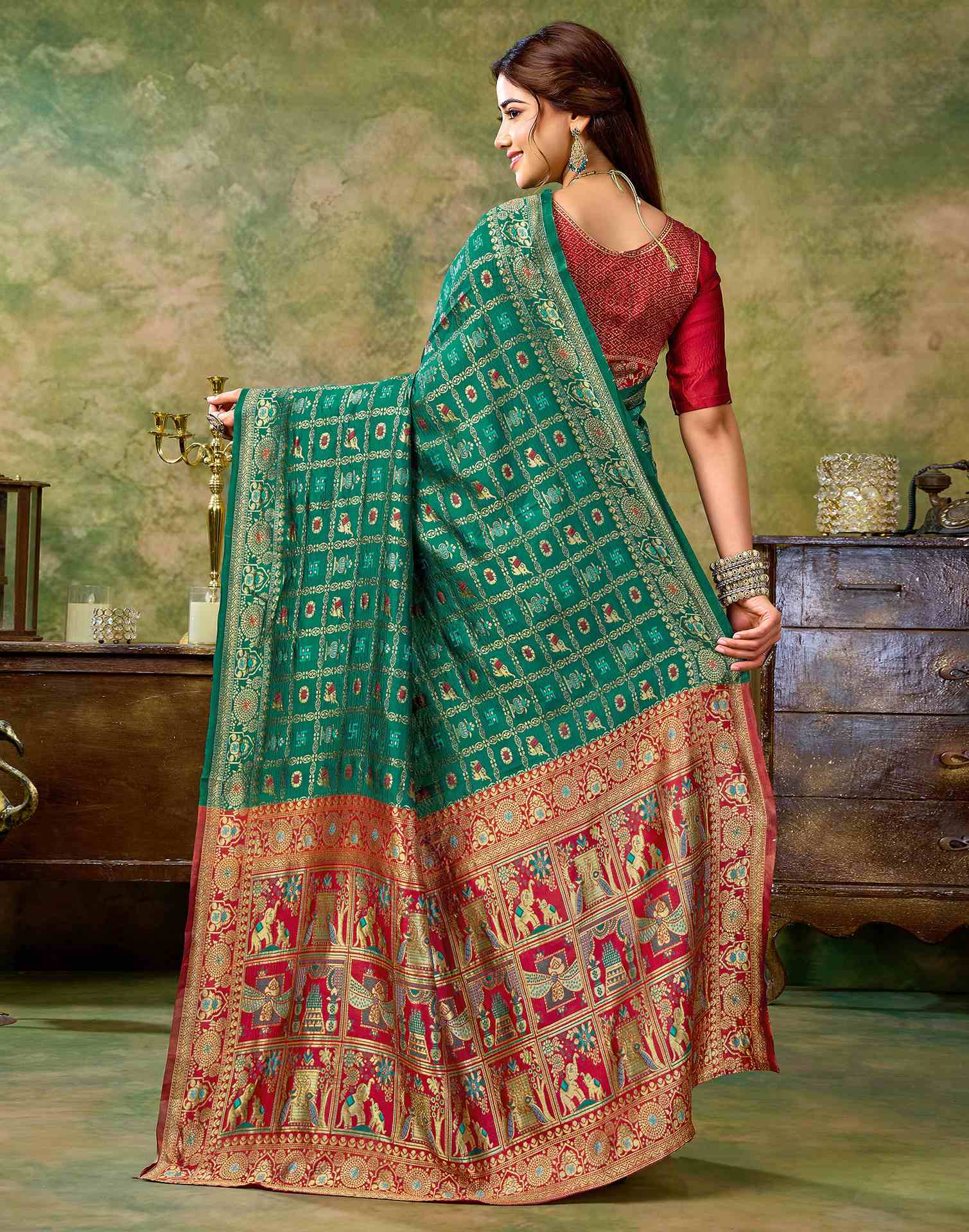 Teal Green Silk Woven Patola Saree