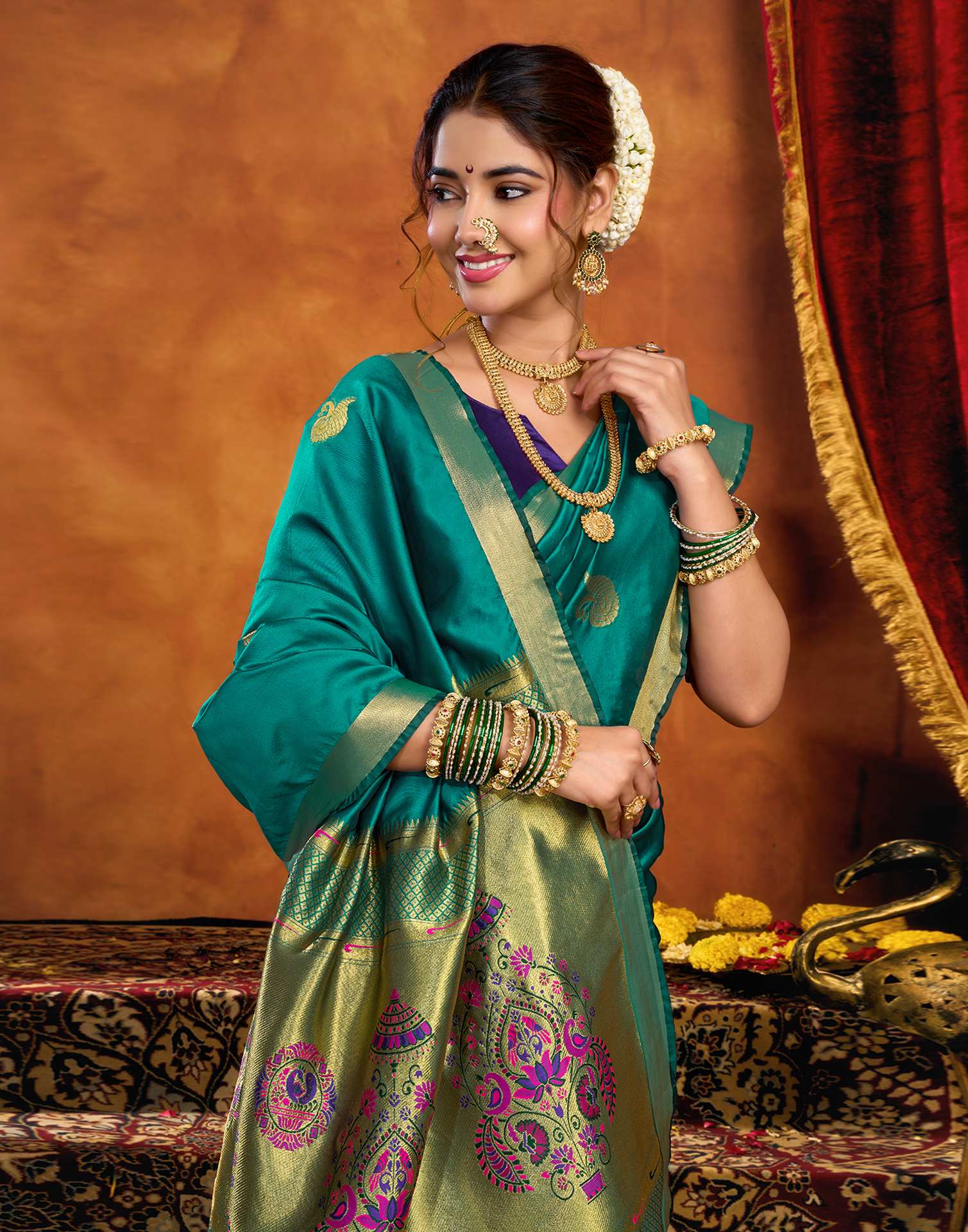 Teal Green Silk Woven Paithani Saree