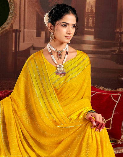 Yellow Georgette Woven Checked Saree